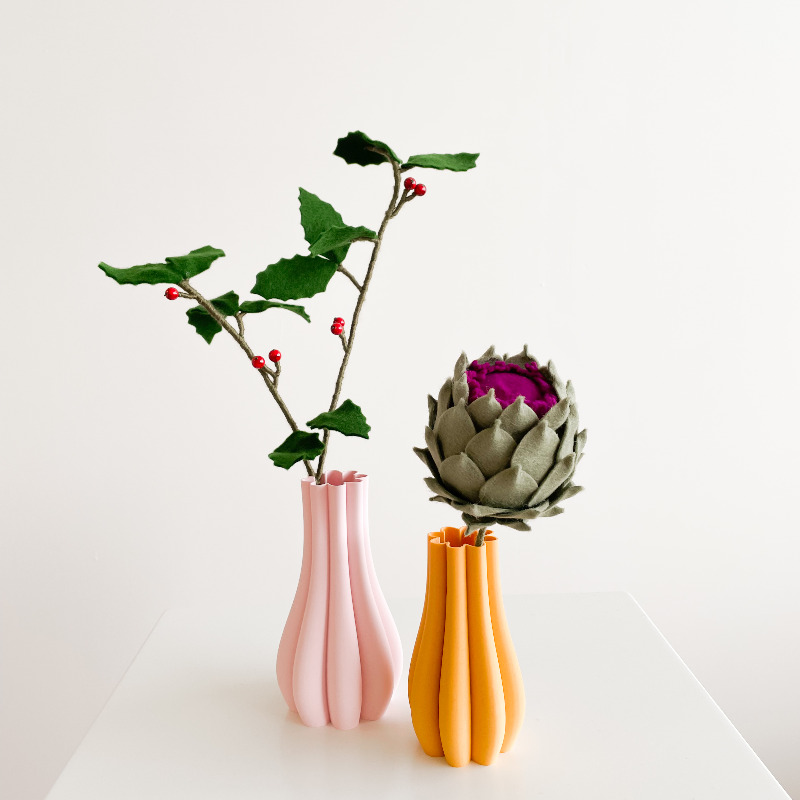 Model E roze en model D okergeel